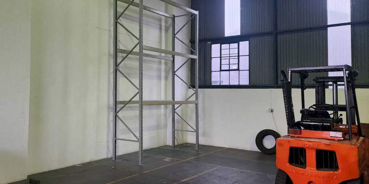 Forklift and empty shelf